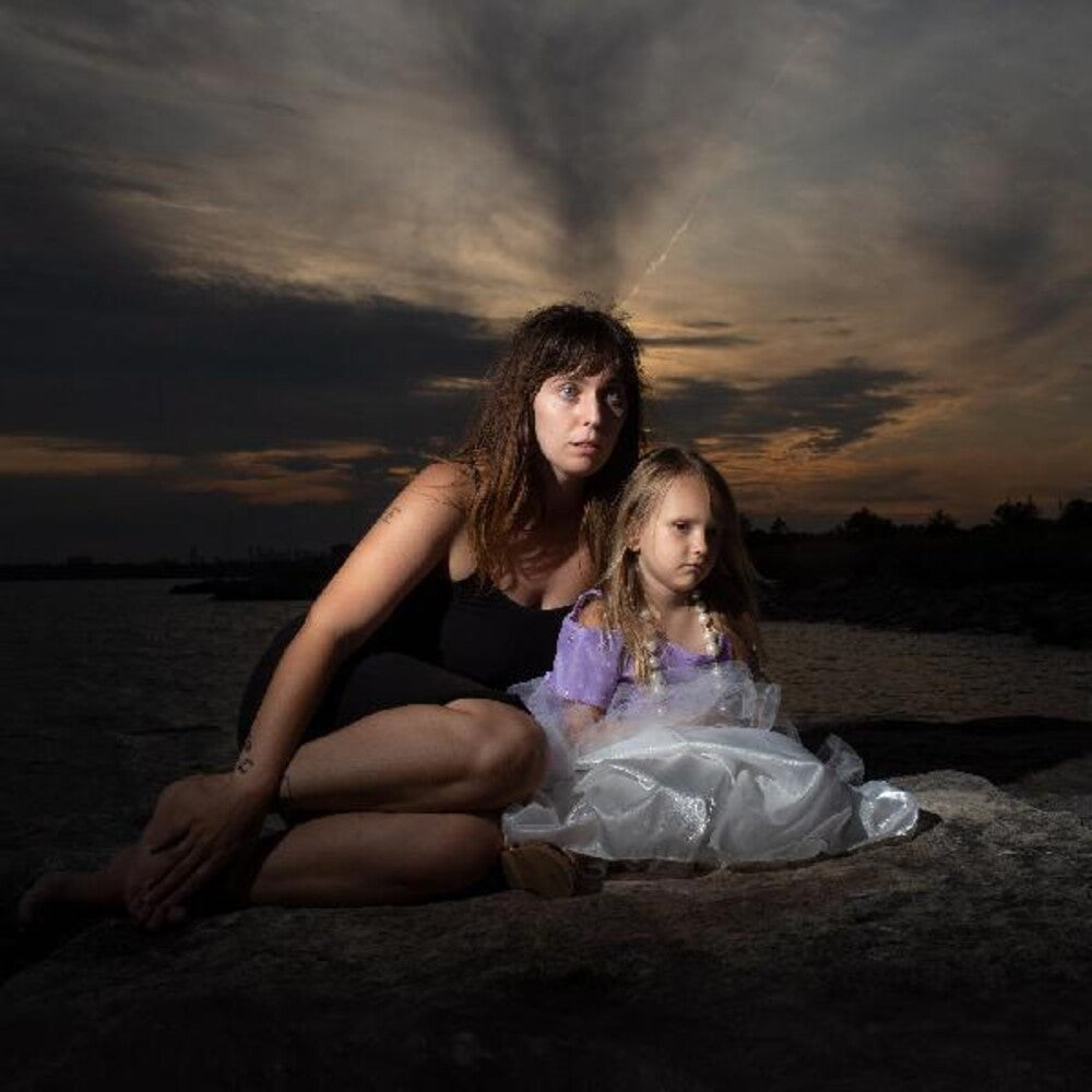 the album cover for U.S. Girls - Heavy Light