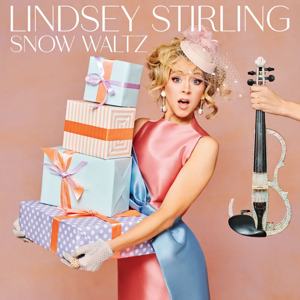 the album cover for Lindsey Stirling - Snow Waltz - Deluxe Edition with 4 Bonus Tracks [Flume]