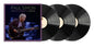 the album cover for Paul Simon - The Quiet Celebration Concert