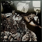 the album cover for Nurse With Wound - Merzbild Schwet (Blk) [Colored Vinyl] (Slv) (Uk)