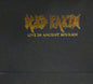 the album cover for Iced Earth - Live In Ancient Kourion (Emb) (Gate) [Limited Edition]