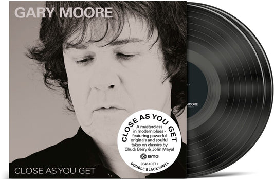 the album cover for Gary Moore - Close As You Get
