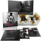 the album cover for Cliff Martinez - Drive: Original Motion Picture Soundtrack - 15th Anniversary [Gold Splatter On Clear]