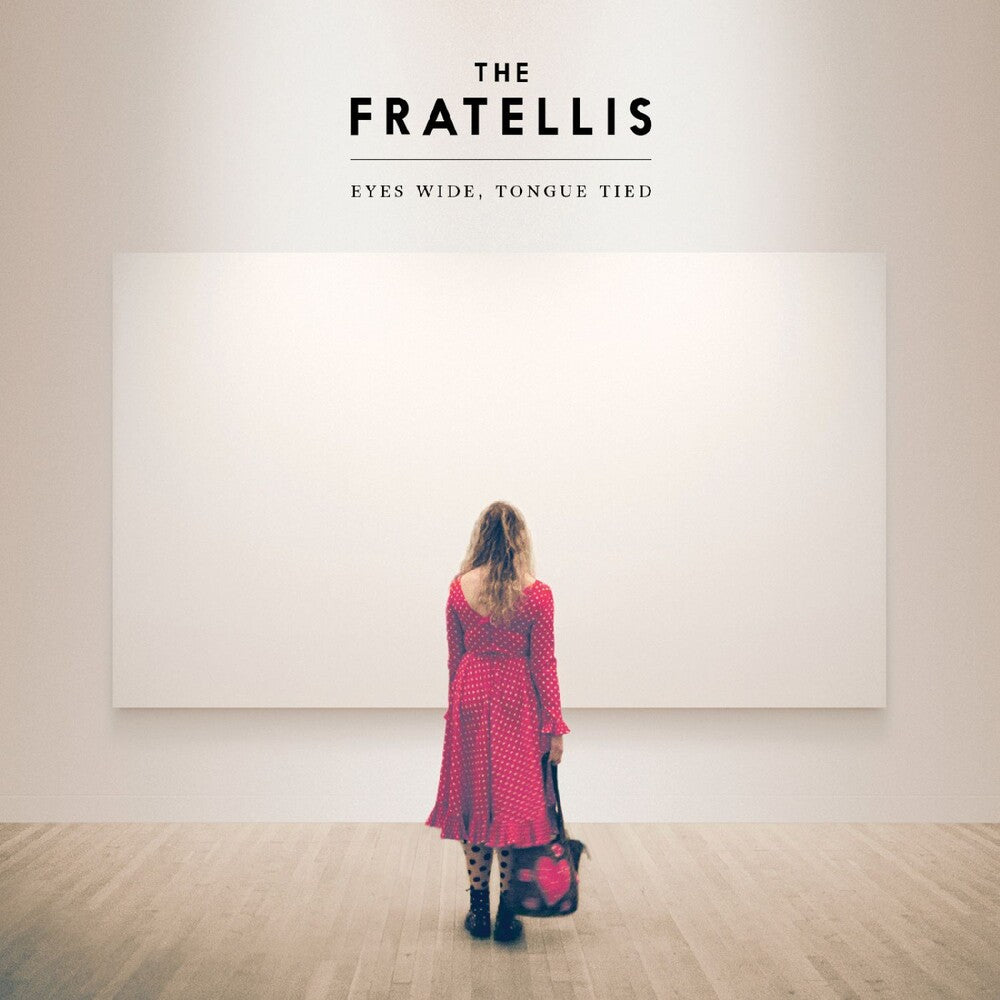 the album cover for Fratellis - Eyes Wide Tongue Tied - Red/White Sunburst [Colored Vinyl]